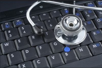 a stethoscope on a laptop keyboard